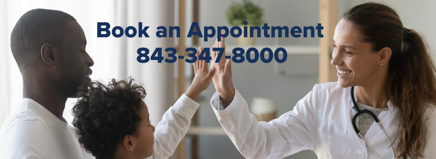 Boy greeting woman doctor during visit meeting in clinic