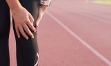 Woman holds on to the knee,Athlete pain in the knee
