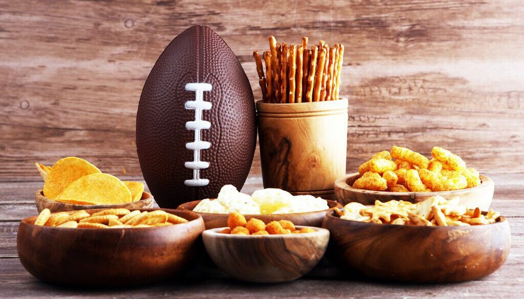 Closeup of a football and healthy game day recipes