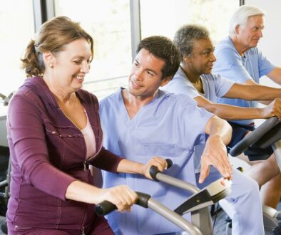Woman in gym during cardiac rehab session