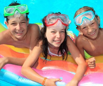 Happy Children Enjoying the Benefits of Water Safety for Kids